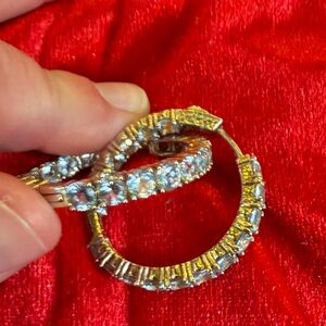 These are aquamarine style hoop earrings from JTV. These have a safety clasp.